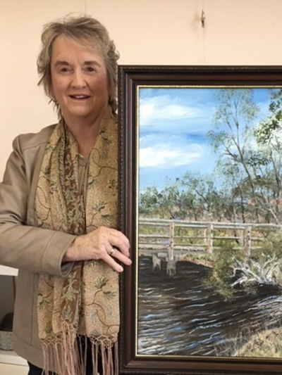 Heather Roberts with one of her artworks